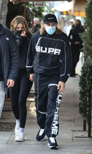 The Kid Laroi’s Outfit in Nike Sneakers & Supreme Hat (2022)