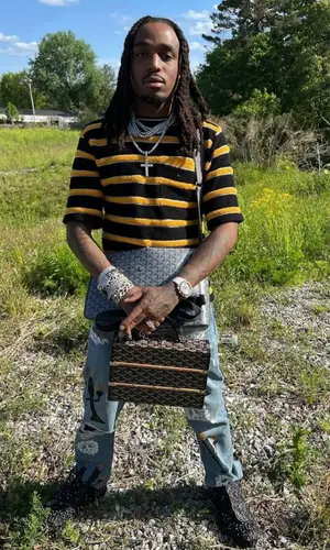 Quavo wearing Goyard belt