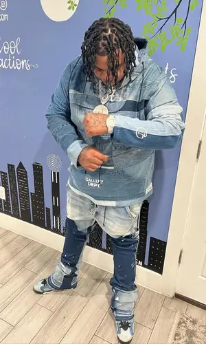 Big Yavo wearing Valabasas jeans