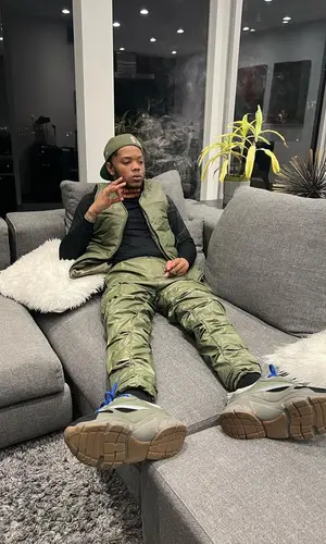 Lil Migo wearing Dior sneakers