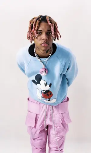 SoFaygo’s Outfit in Urban Outfitters Sweater, Rick Owens Pants & Prada Boots (2022)