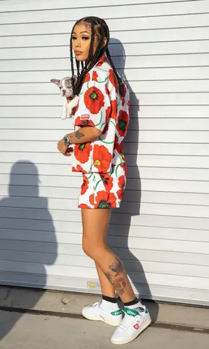 Coi Leray wearing Kenzo shirt