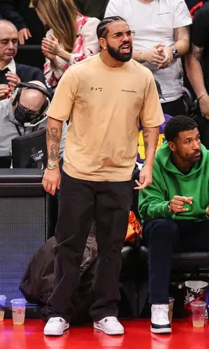 Drake wearing Jordan sneakers