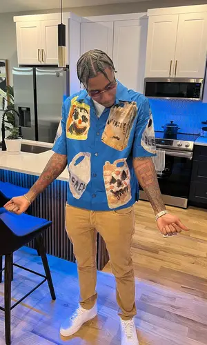 MGM Lett wearing Givenchy shirt