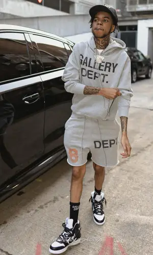 Lil Poppa wearing Gallery Dept. sock