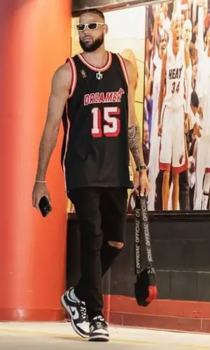 Caleb Martin wearing Mitchell & Ness jersey