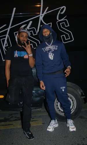 Digga D wearing Take Risks & Prosper hoody