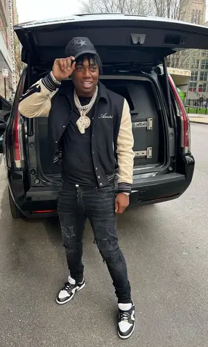Fredo Bang wearing Amiri jeans