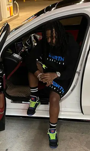 Babyface Ray wearing Amiri sock