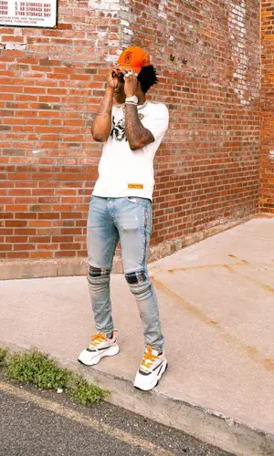 Yungeen Ace wearing Amiri cap