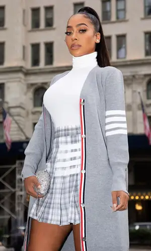 La La wearing Thom Browne jacket