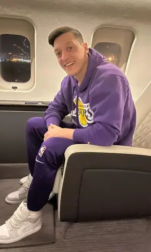 Mesut Ozil wearing Nike pants