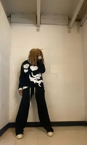 Maajins wearing Rick Owens sneakers