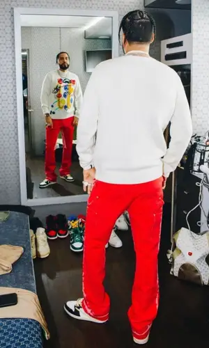 French Montana wearing Fendi sweater