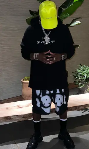 London On Da Track wearing Givenchy cap