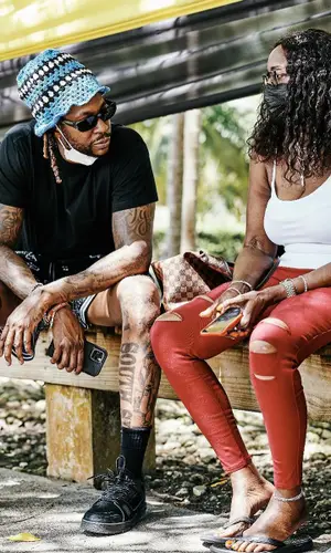 2 Chainz wearing Amiri shorts