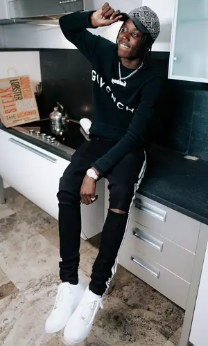 Melvoni wearing Amiri jeans