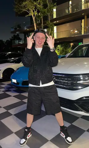 Aitch wearing Gucci backpack