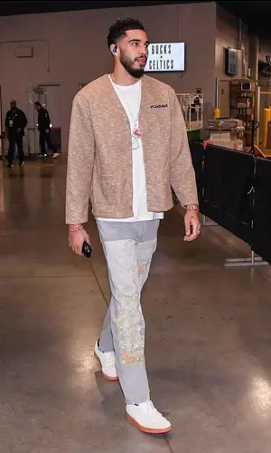 Jayson Tatum wearing Pleasures jeans