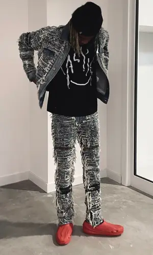 Yung Kayo wearing Alyx jacket
