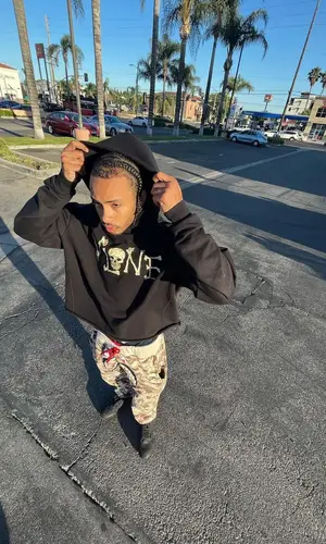 Amari Bailey’s Outfit in Vlone Hoodie, Bape Pants & OVO (2022)