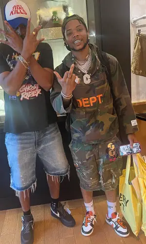 Lil Migo wearing Gallery Dept. bag