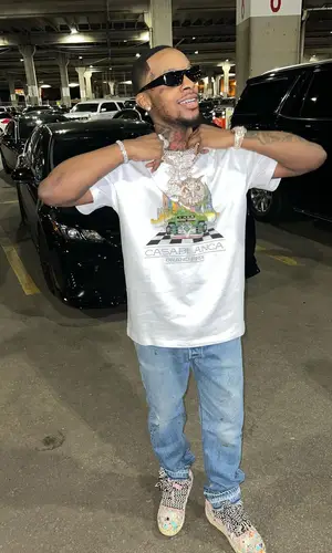 Toosii wearing Prada eyewear