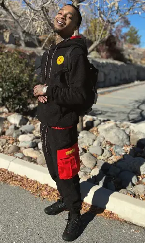 Flight wearing Gucci backpack