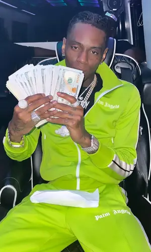 Soulja Boy’s Outfit in Palm Angels Jacket, Jordan Sneakers & Cartier Eyewear (2022)