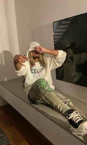 Haan wearing Celine hoody