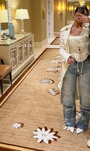 Kylie Jenner’s Outfit in Dion Lee Jacket, Heron Preston Jeans & Ruby Stella Jewelry (2022)