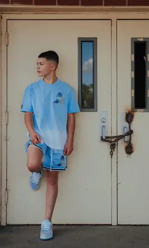 Javon Walton wearing Avirex t-shirt