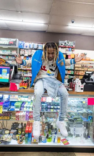 Lil Durk’s Outfit in Rhude Jacket, Louis Vuitton T-Shirt & The Webster (2022)
