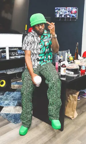 Lil Dann wearing Cactus Plant Flea Market pants
