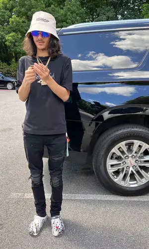 BabyTron wearing Off-White hat
