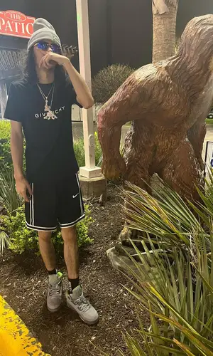 BabyTron wearing Nike shorts