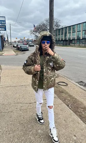 BabyTron wearing Supreme jacket