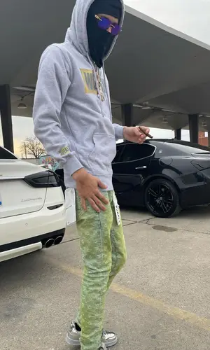 BabyTron wearing The Wealthy Brand hoody