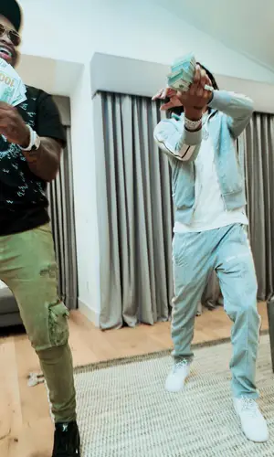 Ja Morant wearing Palm Angels jacket