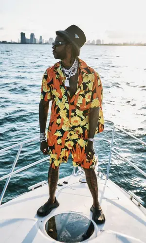 2 Chainz wearing Loewe shirt