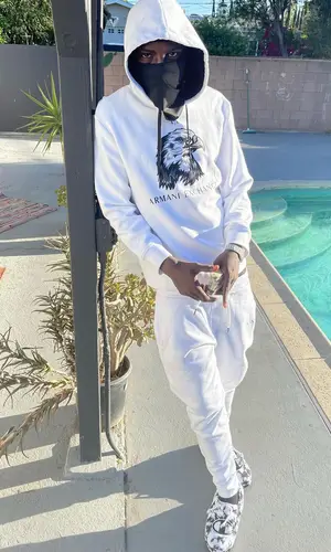 PGF Nuk wearing Armani Exchange pants