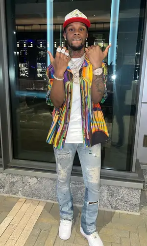 Toosii wearing Givenchy shirt