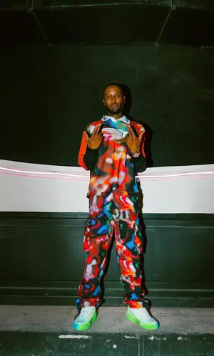 Shy Glizzy wearing Prada sneakers