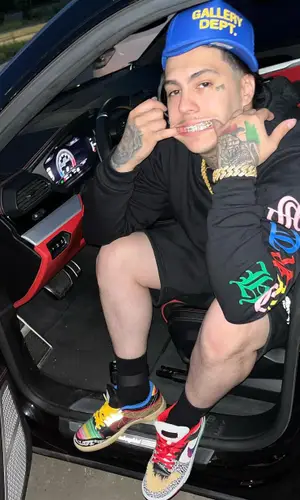 Peso Peso wearing Chrome Hearts hoody