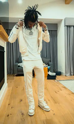 Ja Morant wearing Palm Angels pants