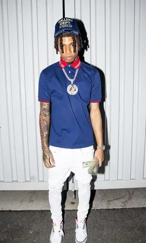 NLE Choppa wearing Gallery Dept. hat