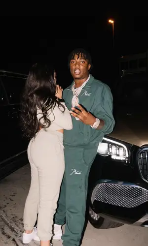 Fredo Bang wearing Rhude sweatshirt