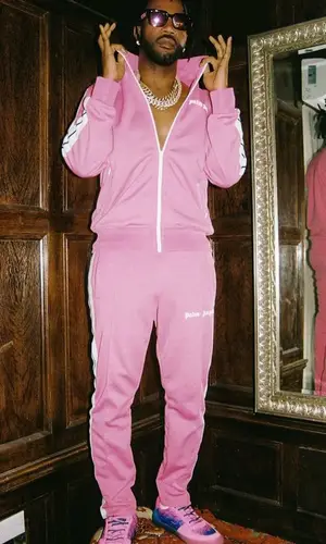 Juicy J wearing Palm Angels jacket