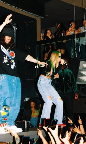 Russ wearing KidSuper jeans