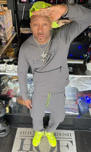 Drumma Boy wearing Richking cap